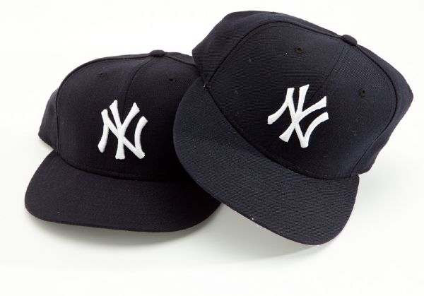 JULIUS "DR. J" ERVINGS PAIR OF NEW YORK YANKEES CAPS PERSONALLY INSCRIBED BY ALEX RODRIGUEZ AND REGGIE JACKSON